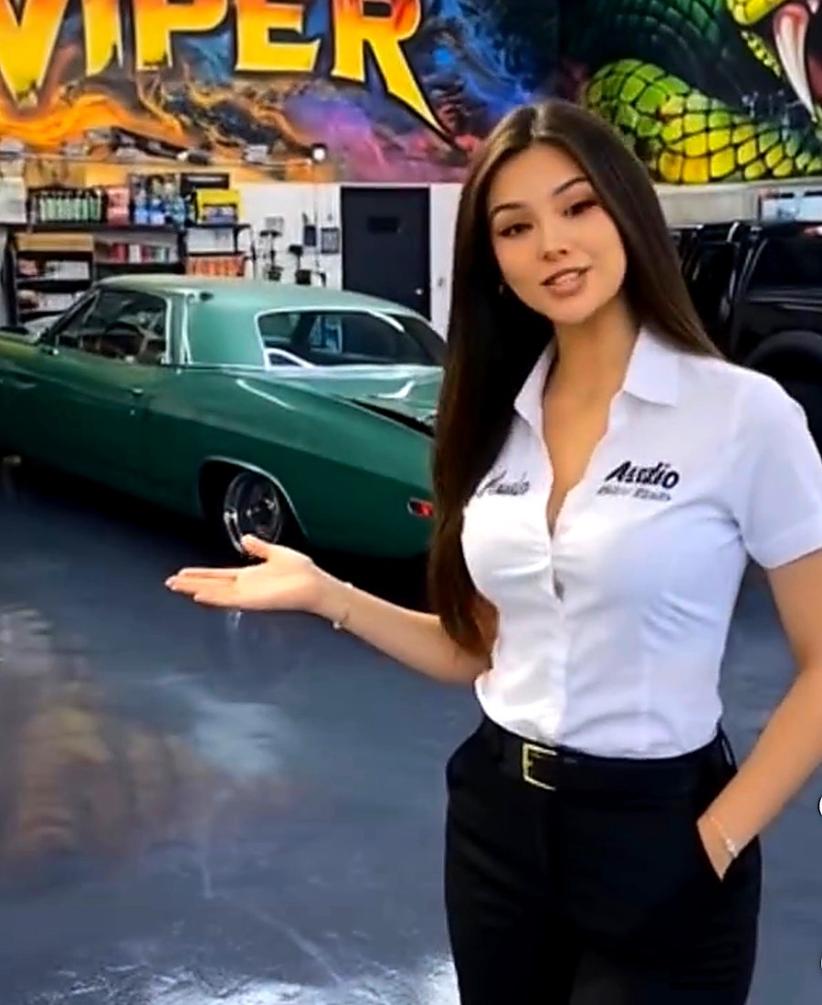 Los Angeles Car Alarm team member in front of the Viper shop mural